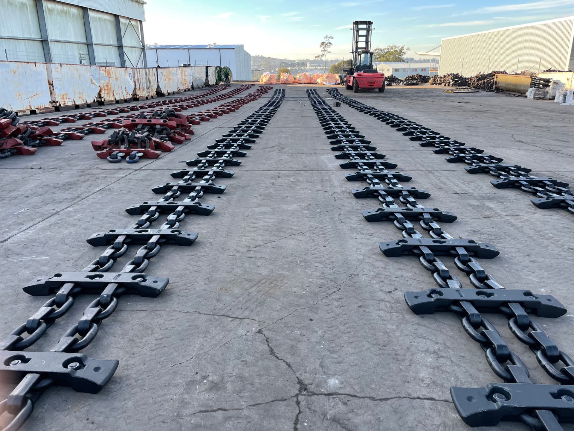 Rows of longwall chain with flight bars laid out across the Ellton yard